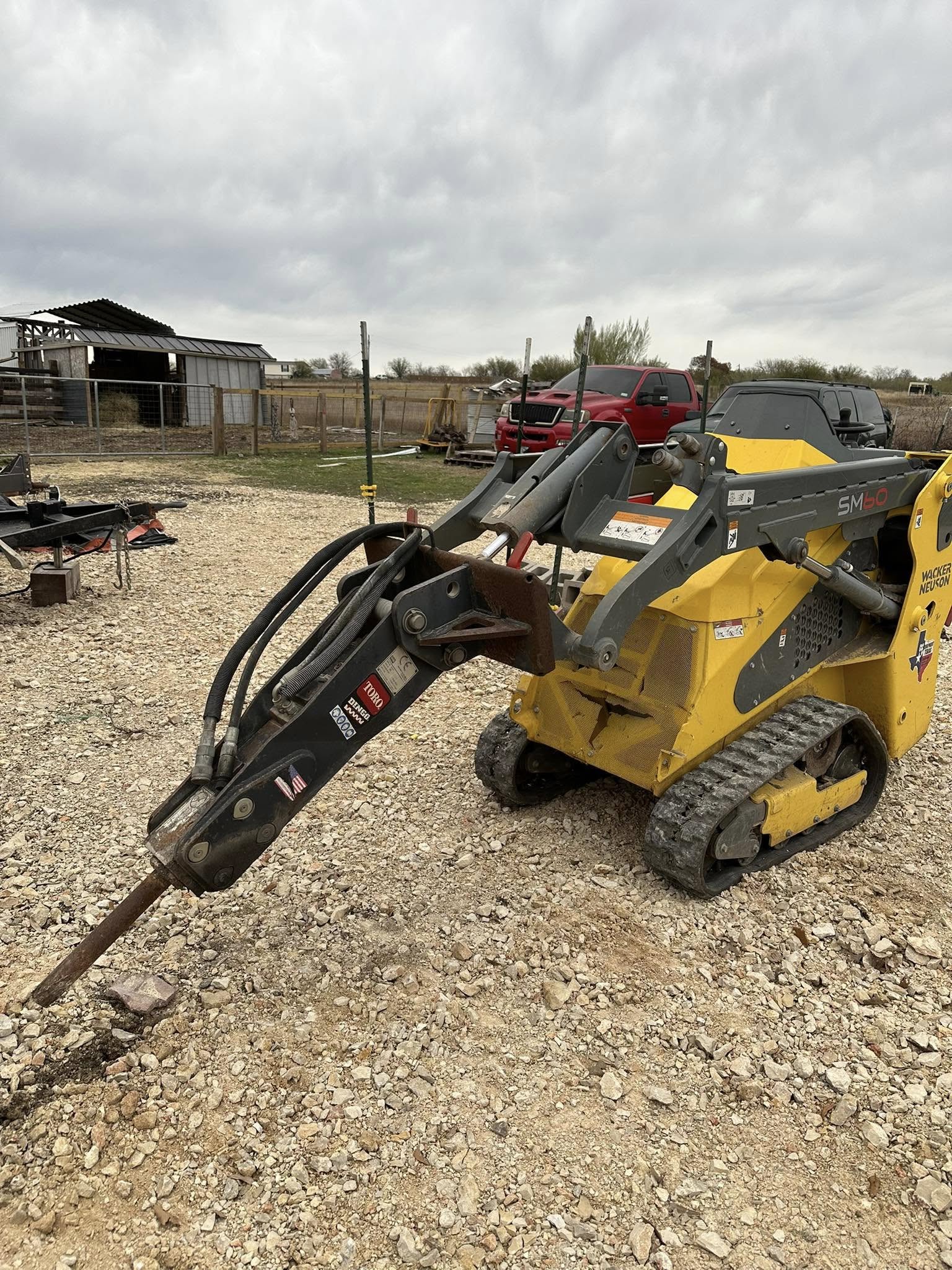 Wacker Neuson skid steer with hydraulic spike attachment